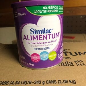 Six cans of Alimentum 12.1—expires 11/22